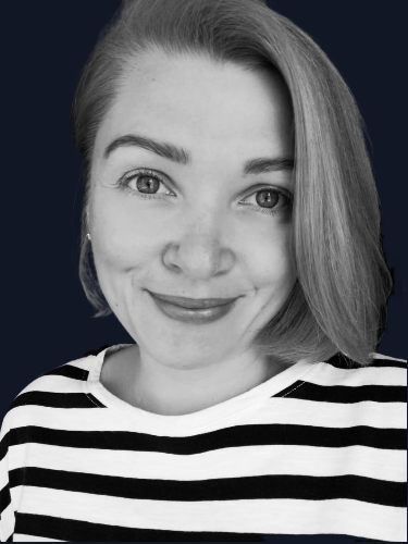 a head-shot of Katerina Nattrass smiling at the camera